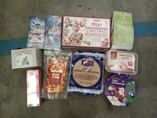 PALLET OF ASSORTED ITEMS INCLUDING DRAGON BALL PHONE CASES, SPECIAL MADRAS POPPADOMS, CADBURY CHRISTMAS TREE DECORATIONS, UV NAIL LAMP, GINGERBREAD CHRISTMAS DECORATING KIT, POPYUM PEANUT CHEW POPCORN