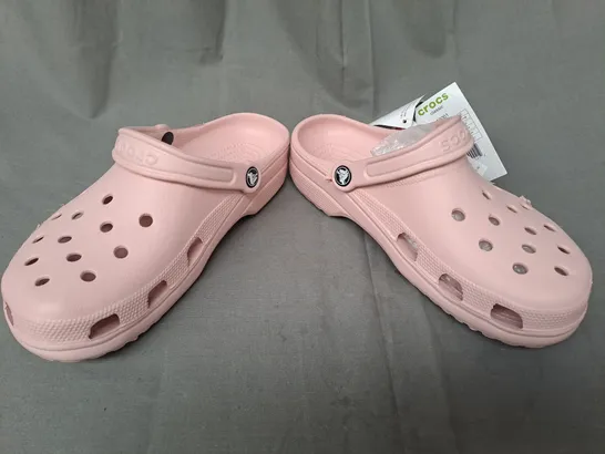 PAIR OF CROCS CLASSICS IN PINK UK SIZE M5/W6