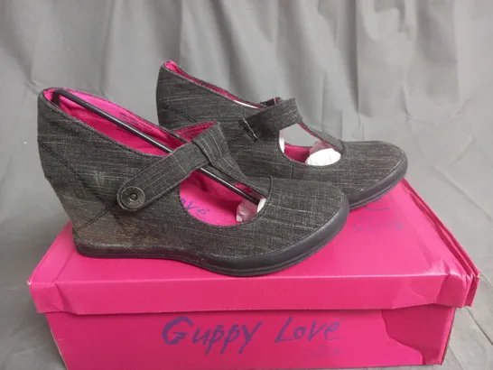 BOX OF APPROXIMATELY 7 BLACK  GUPPY LOVE BY BLOWFISH SHOES IN VARIOUS SIZES 