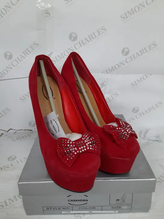 BOXED PAIR OF CASANDRA PLATFORM STILLETTO HEEL IN RED SUEDE WITH RHINESTONE BOW DETAIL SIZE 5