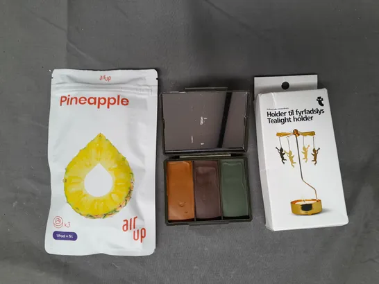 APPROXIMATELY 10 ASSORTED HOUSEHOLD ITEMS TO INCLUDE AIR UP PINEAPPLE POD, CAMOUFLAGE FACE PAINT, TEALIGHT HOLDER, ETC