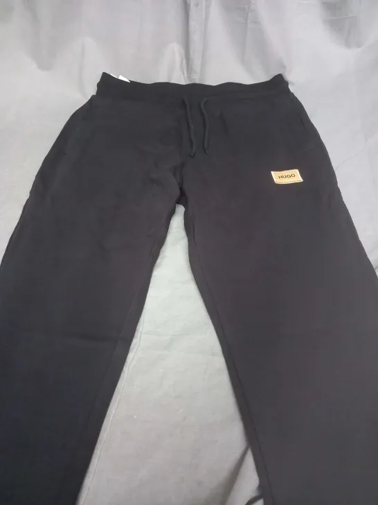 HUGO BOSS BLACK TROUSERS -  SIZE UNSPECIFIED 