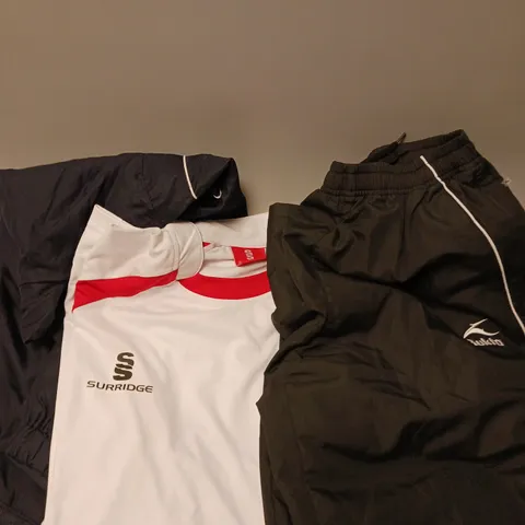 APPROXIMATELY 10 ASSORTED SPORTS CLOTHING PRODUCTS IN VARIOUS SIZES TO INCLUDE TRACKSUITS, SHORTS, TSHIRTS ETC 