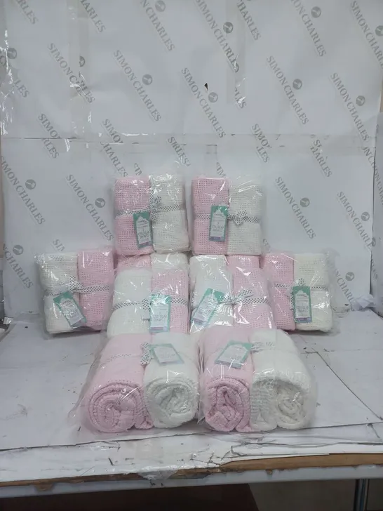 10 PACKS OF 2 CELLULAR SHAWLS PINK AND WHITE