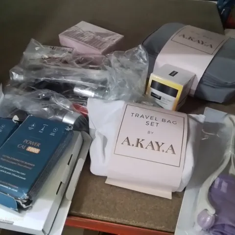 BOX OF ASSORTED MAKE UP PRODUCTS INCLUDING, A.KAY.A TRAVEL BAG SETS, SALON PRO HEATLESS CURLERS, FACE ROLLER, DAY CREAM, HEATED JUMBO BLANKET.