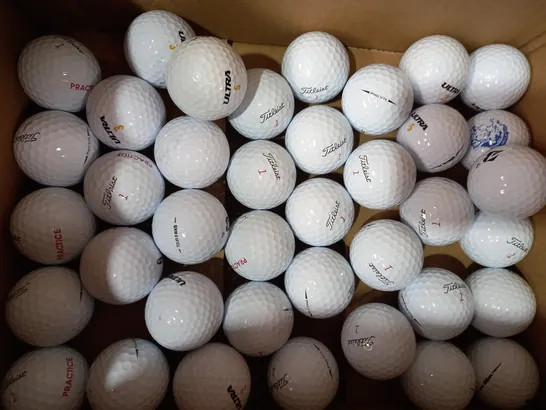 BOX OF APPROXIMATELY 25 ASSORTED GOLF BALLS