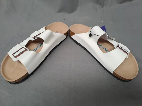 PAIR OF BIRKENSTOCK OPEN TOE SANDALS IN WHITE EU SIZE 41