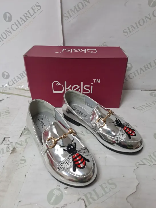 APPROXIMATELY 12 PAIRS  OF BOXED KELSI SILVER BEE PUMPS IN VARIOUS SIZES 