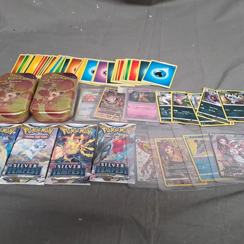 LARGE ASSORTMENT OF COLLECTABLE POKEMON TRADING CARDS TO INCLUDE TINS, BOOSTER PACKS AND LOOSE CARDS