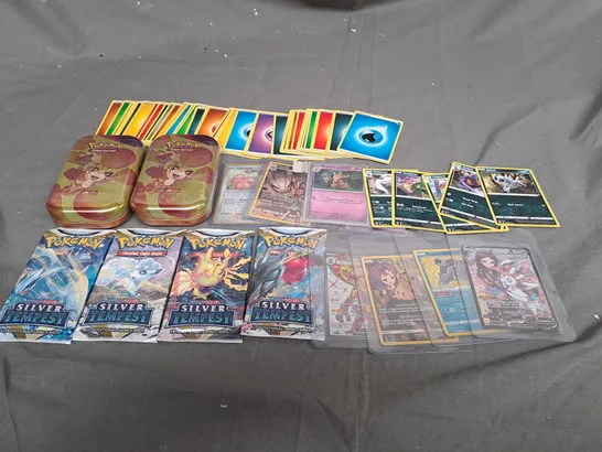 LARGE ASSORTMENT OF COLLECTABLE POKEMON TRADING CARDS TO INCLUDE TINS, BOOSTER PACKS AND LOOSE CARDS