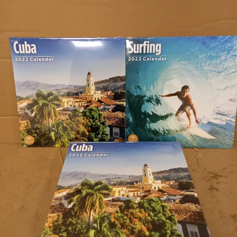 LOT OF APPROXIMATELY 55 ASSORTED 2022 CALENDARS TO INCLUDE CUBA AND SURFING