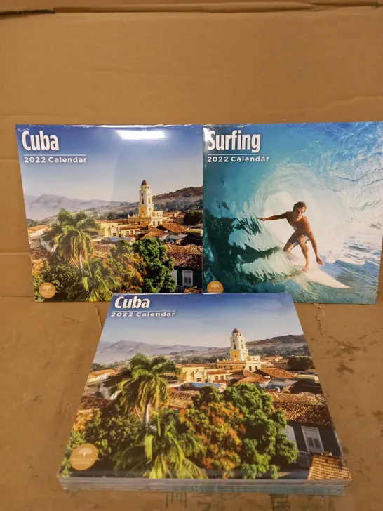 LOT OF APPROXIMATELY 55 ASSORTED 2022 CALENDARS TO INCLUDE CUBA AND SURFING