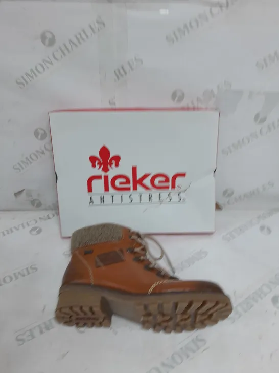 BOXED PAIR OF RIEKER WATER RESISTANT HIKING BOOTS IN BROWN ZIP UP SIZE 4