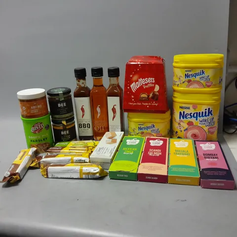 LOT OF ASSORTED FOOD ITEMS TO INCLUDE NESQUIK STRAWBERRY POWDER, CARRINGTONS CHILLI OIL, ETC