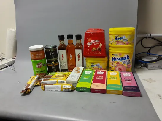 LOT OF ASSORTED FOOD ITEMS TO INCLUDE NESQUIK STRAWBERRY POWDER, CARRINGTONS CHILLI OIL, ETC