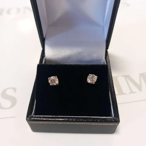 PLATINUM STUD EARRINGS SET WITH NATURAL DIAMONDS WEIGHING +0.83CT