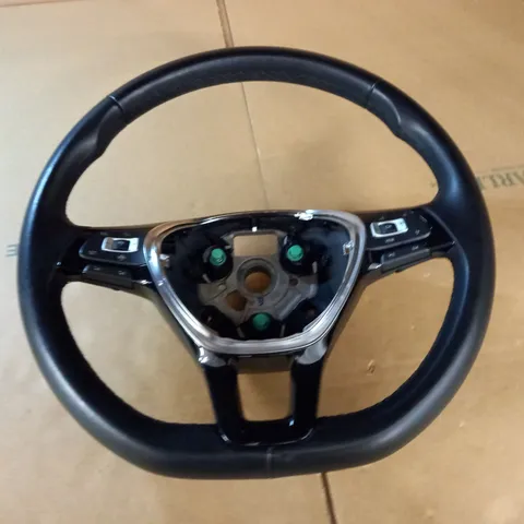 AUTOMOBILE STEERING WHEEL WITH PADDLES