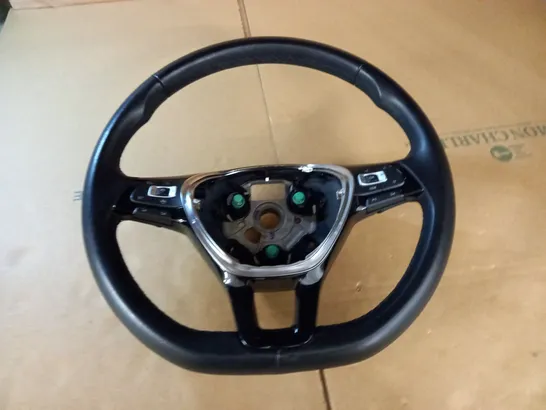 AUTOMOBILE STEERING WHEEL WITH PADDLES