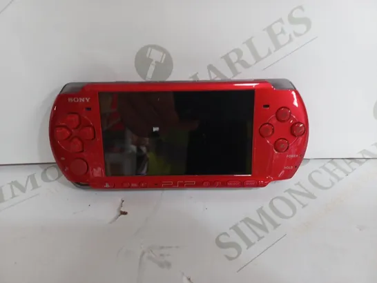 SONY PSP IN RUBY RED HAND HELD GAME CONSOLE