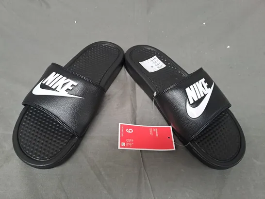 PAIR OF NIKE SLIDERS IN BLACK/WHITE UK SIZE 8