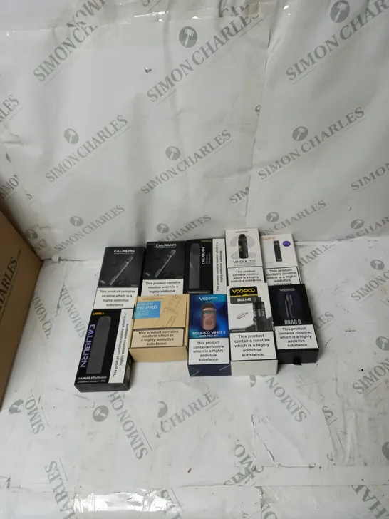 BOX OF APPROXIMATELY 10 ECIG PRODUCTS TO INCLUDE CALIBURN, VAPORESSO, ASPIRE