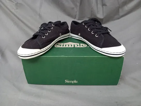 BOXED PAIR OF SIMPLE SATIRE CANVAS SNEAKERS IN BLACK SIZE 4