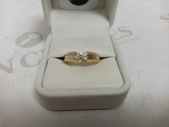 DESIGNER 18CT GOLD SOLITAIRE RING TENSION-SET WITH A MARQUISE CUT DIAMOND