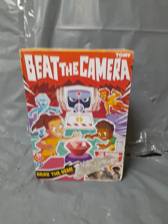 TOMY BEAT THE CAMERA GAME RRP £22.99