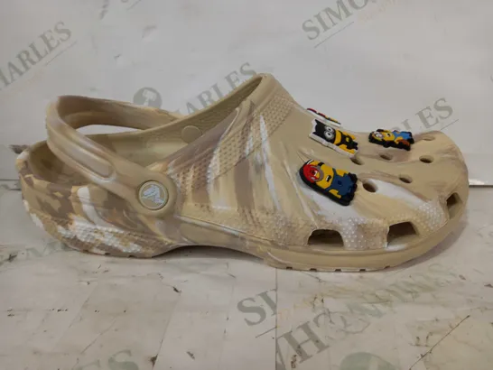 BOXED PAIR OF CROCS CLASSIC MARBLED CLOGS IN SAND COLOUR W. MINIONS CHARMS SIZE M11