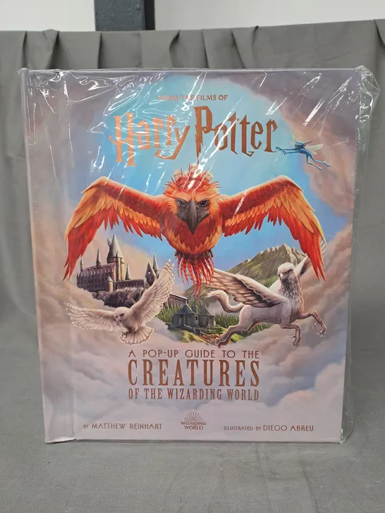 HARRY POTTER A POP-UP GUIDE TO THE CREATURES OF THE WIZARDING WORLD