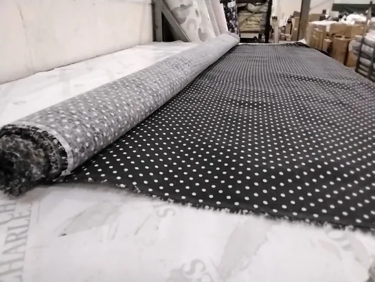 ROLL OF BLACK DOTTED FABRIC 