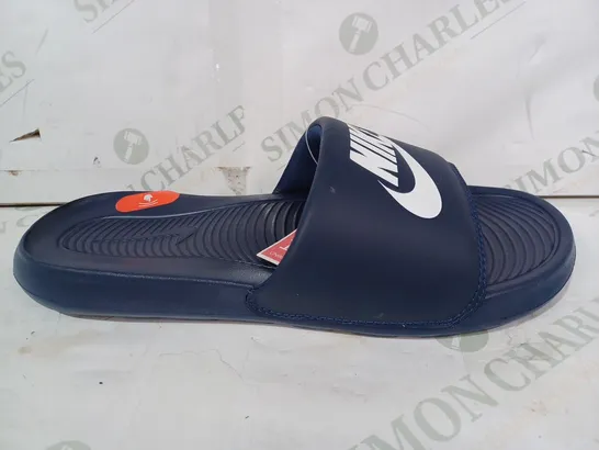 BOXED PAIR OF NIKE SLIDERS IN NAVY UK SIZE 9