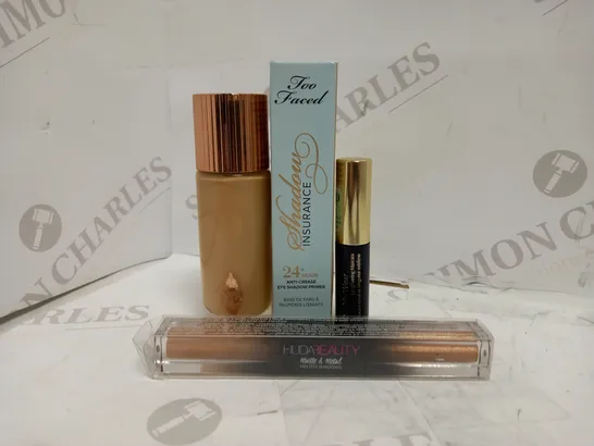 LOT OF 4 DESIGNER MAKE UP ITEMS, TO INCLUDE ESTEE LAUDER, HUDA, TOO FACED & CHARLOTTE TILBURY