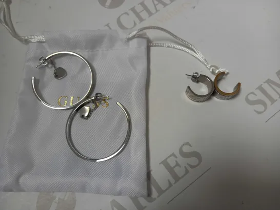 BOX OF 2 GUESS ITEMS ROUND HARMONY LADIES HOOP EARRINGS AND HEART TO HEART LADIES HOOP EARRINGS  RRP £88