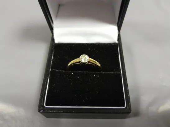 14CT GOLD SOLITAIRE RING RUB-OVER SET WITH NATURAL DIAMOND