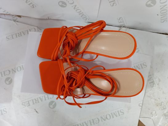 BOXED PAIR OF ORANGE SQUARE TOED STRAPPY HEELED SANDALS