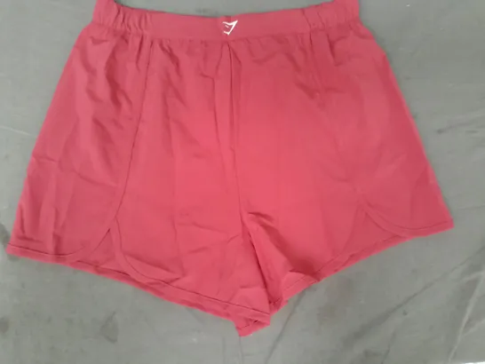 GYM SHARK SCALLOP HEM SHAPED SHORTS IN PINK SIZE LARGE