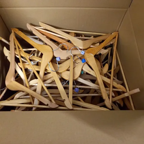 LARGE QUANTITY OF WOODEN CLOTHES HANGERS 