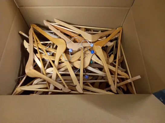 LARGE QUANTITY OF WOODEN CLOTHES HANGERS 