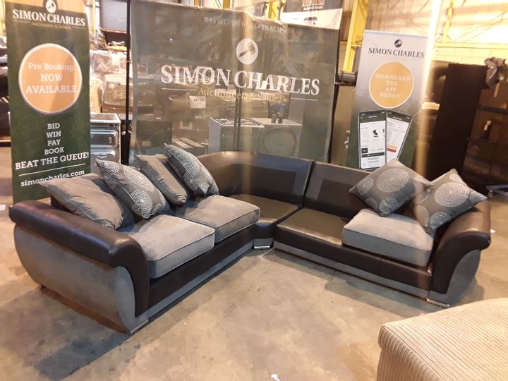 GREY AND BLACK FABRIC LARGE CORNER SOFA 3149626Simon Charles Auctioneers
