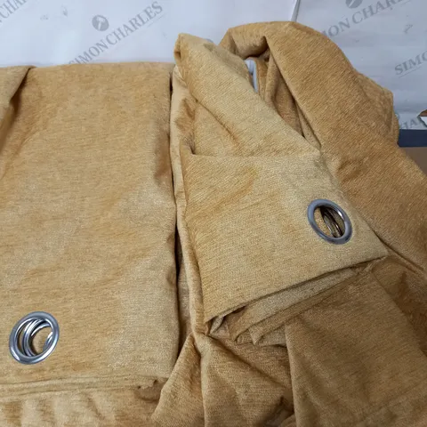 PAIR OF EYELET CURTAINS IN MUSTARD - SIZE UNSPECIFIED