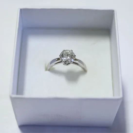 18CT WHITE GOLD SOLITAIRE RING SET WITH A DIAMOND WEIGHING +1.23CT