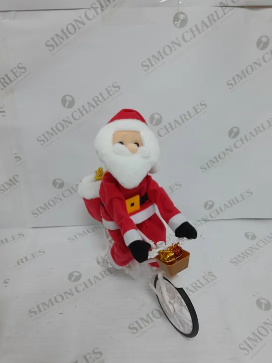 MR CHRISTMAS PRE-LIT MUSICAL CYCLING SANTA