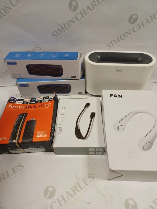 BOX TO CONTAIN APPROX. 7 X ASSORTED TECH PRODUCTS. INCLUDES NECK FANS, SPEAKERS, FIRE TV STICK ETC 