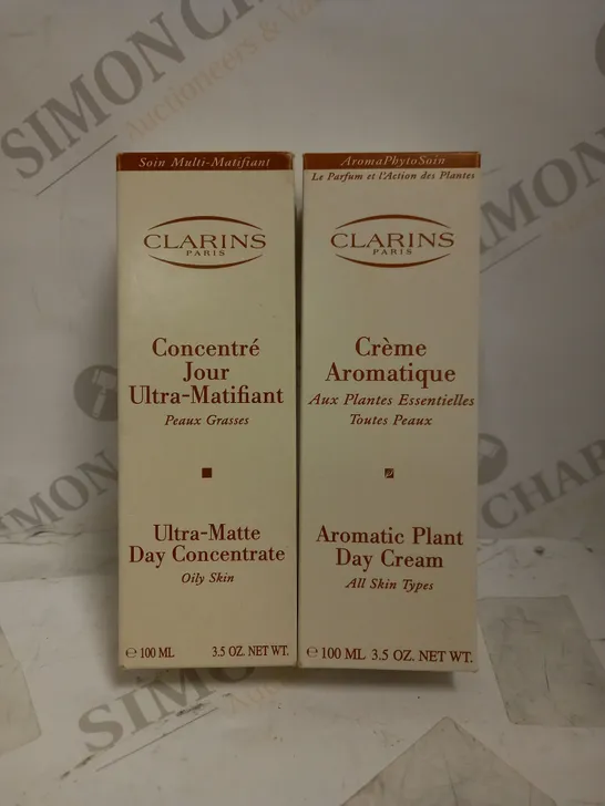 LOT OF 2 ASSORTED CLARINS PRODUCTS TO INCLUDE AROMATIC PLANT DAY CREAM 100ML & ULTRA-MATTE DAY CONCENTRATE 100ML