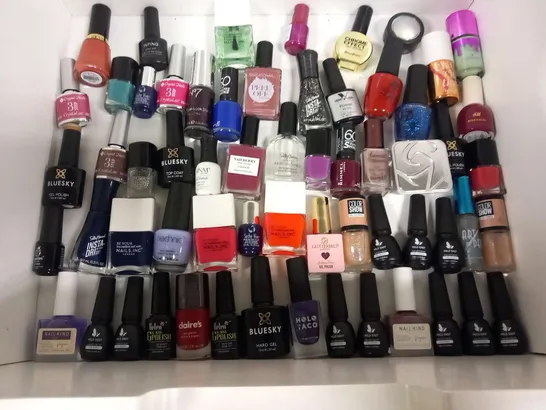 APPROXIMATELY 90 ASSORTED NAIL VARNISH/GELS TO INCLUDE; REVOLUTION, STAR GAZER, BLUESKY, CRYSTAL NAILS, SALLY HANSEN, NAILS INC, MILD EAST AND CLAIRE'S