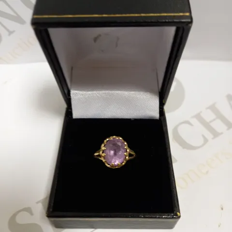 BOXED GOLD EFFECT RING WITH PURPLE SPARKLE STONE