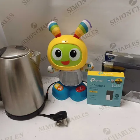 LOT OF 4 HOUSEHOLD ITEMS TO INCLUDE SILVER KETTLE, TP LINK MINI ADAPTER, OLYMPUS RAINPROOF MULTIPURPOSE WRAPPING CLOTH, FISHERPRICE BRIGHT BEATS DANCE & MOVE BEATBO TOY