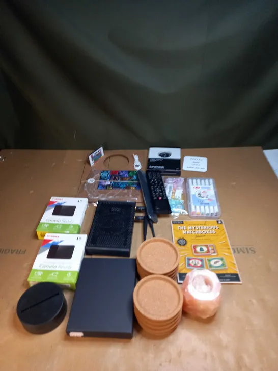 LOT OF ASSORTED ITEMS TO INCLUDE PENS, WIFI ROUTERS AND PORTABLE STORAGE 