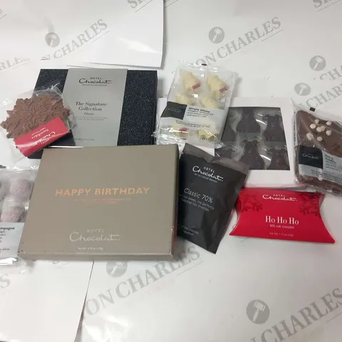 APPROXIMATELY 10 ASSORTED HOTEL CHOCOLAT PRODUCTS TO INCLUDE; MILK AND COOKIES SLAB, HO HO HO, THE SLEIGH TEAM, SIMPLE WHITE, HAPPY BIRTHDAY SIGNATURE, THE SIGNATURE COLLECTION CLASSIC AND PINK CHAMPA